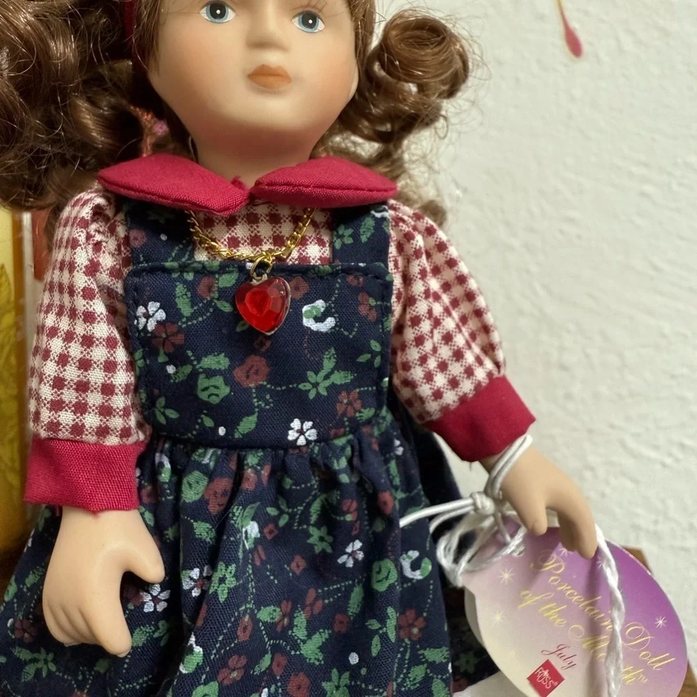 Russ Doll with Navy Floral Dress and Red Accents